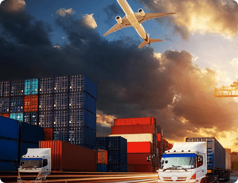 Shipping containers and trucks at a port with a plane overhead