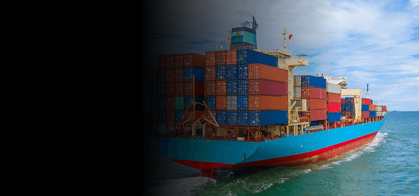 Cargo ship loaded with shipping containers at sea