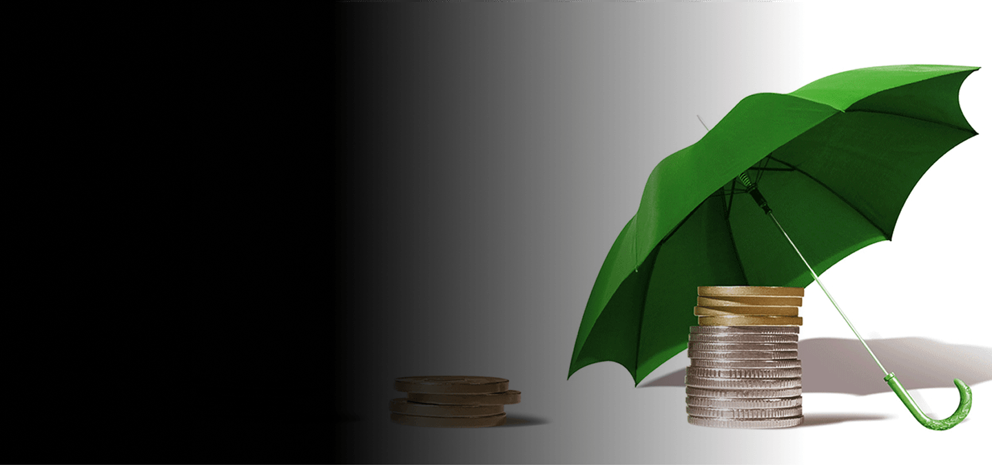 Green umbrella shielding stacked coins