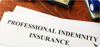 Professional indemnity insurance document on a desk